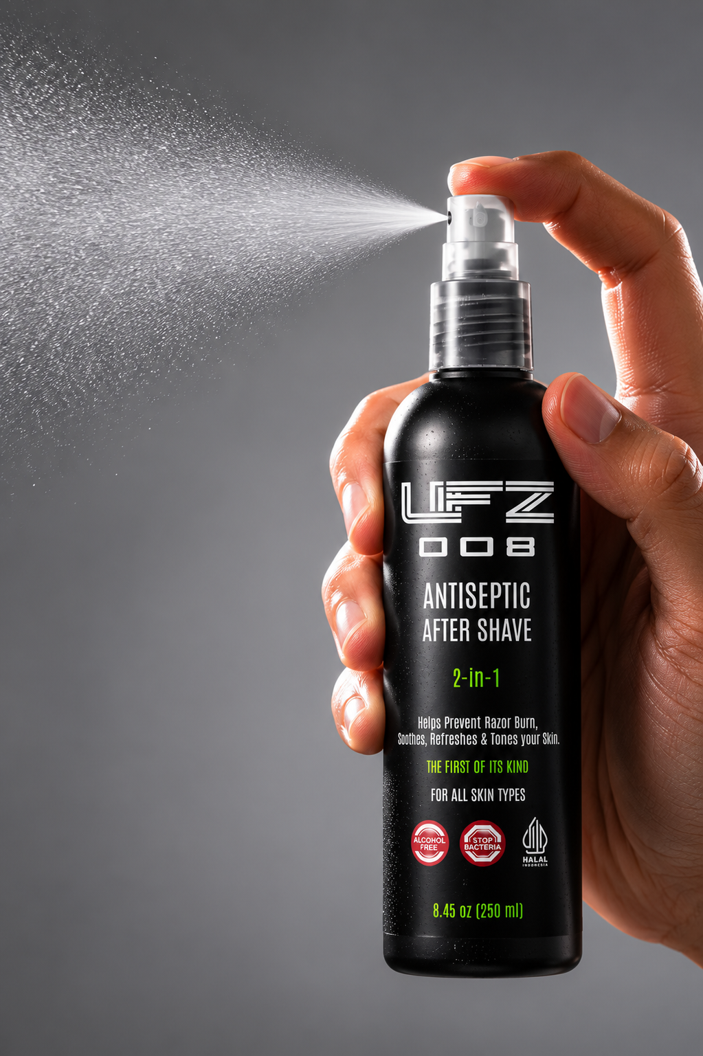Hand spraying the UFZ 008 antiseptic after shave bottle